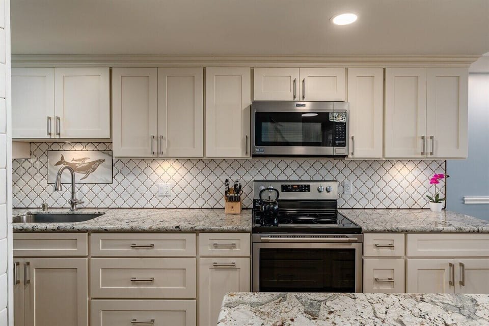 Cook with ease in our beautifully updated kitchen! New counters, cabinets, and appliances await your culinary creations.
