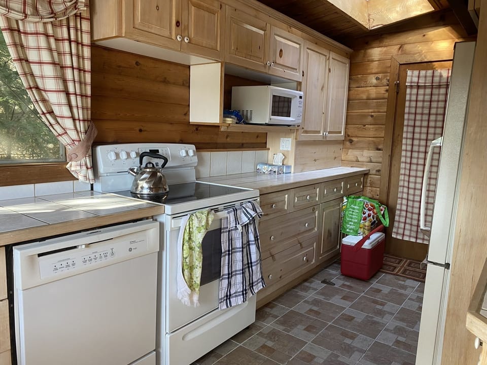 Kitchen - stove, microwave, coffee maker, double sinks, fridge has an ice maker