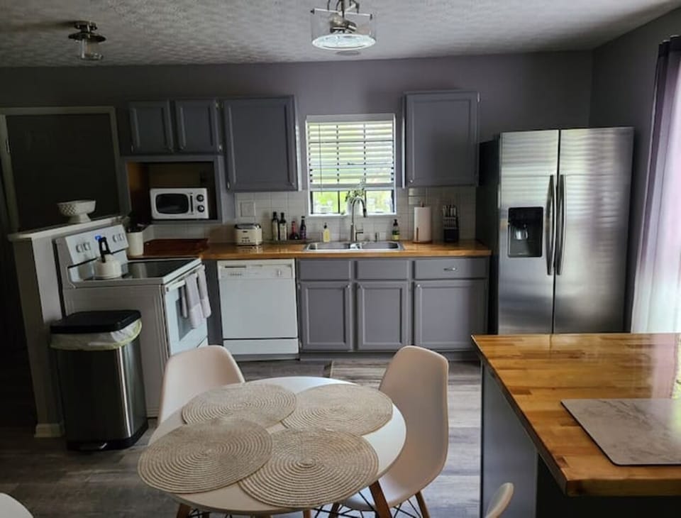 Full kitchen stocked with everything you need for meal preparation. 