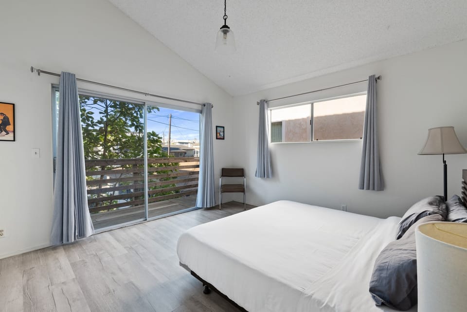 Spacious bedroom with natural light and storage