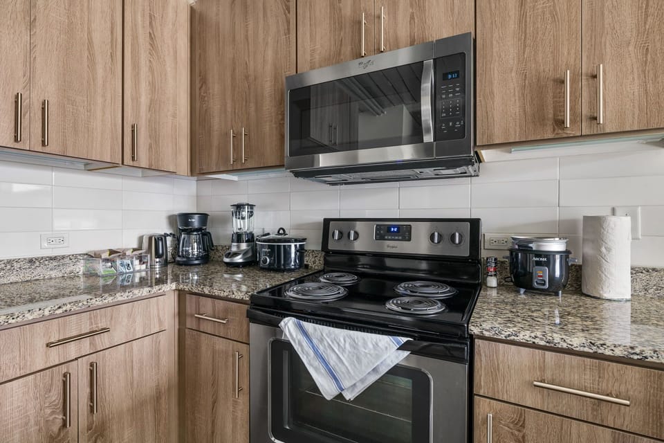 Prepare culinary masterpieces in this modern kitchen with all the essentials.