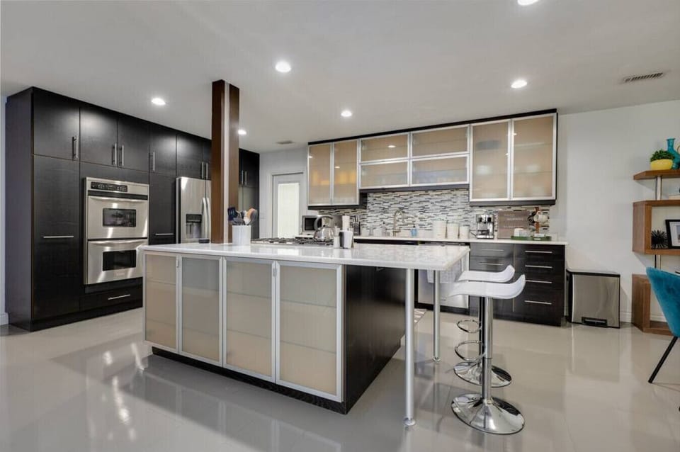 [Kitchen] Fully equipped & stocked.  2 ovens and powerful gas stove.