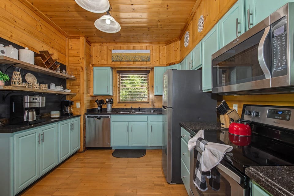 Cook for the whole crew — stainless appliances, dishwasher, and ample prep space