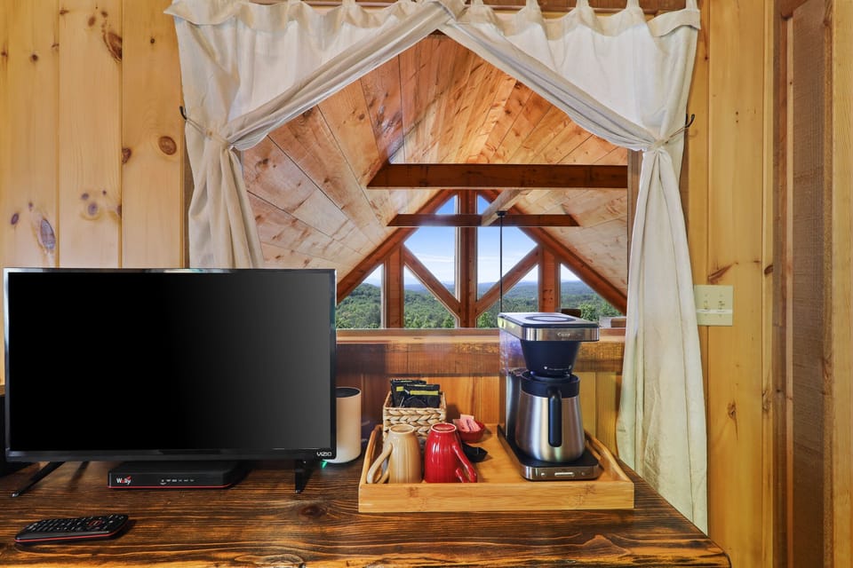 Enjoy a hot cup of coffee from bed in the master bedroom!