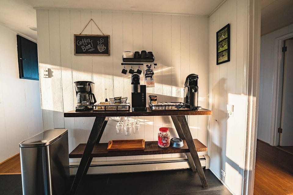 Coffee bar w/ Drip Coffee, Kurig, and Nespresso Vertuo machine for guests to choose from