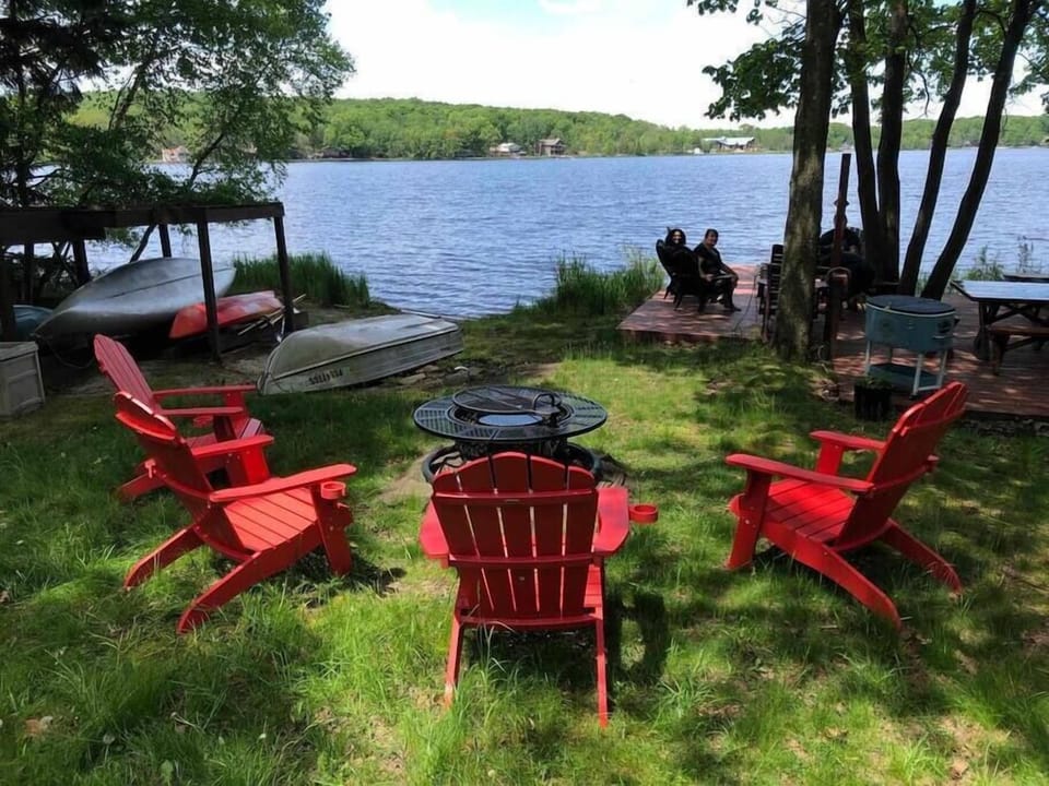 Relax by the fire pit or on the waterside deck. (Or grab a boat and tour the lake!)