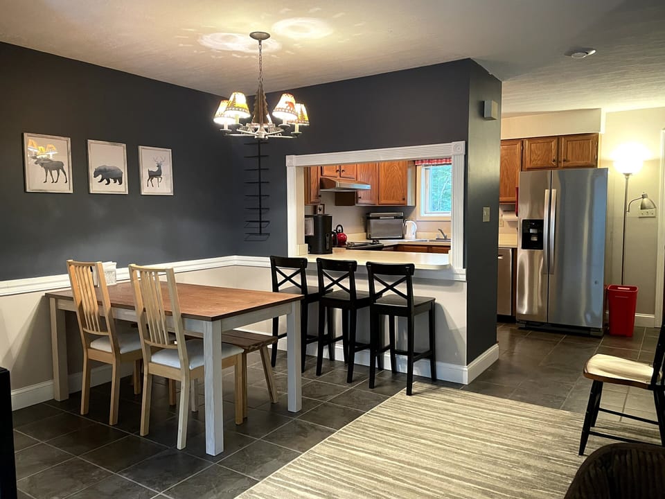 Dining Area/Kitchen. We have a folding table and extra chairs if you need more.