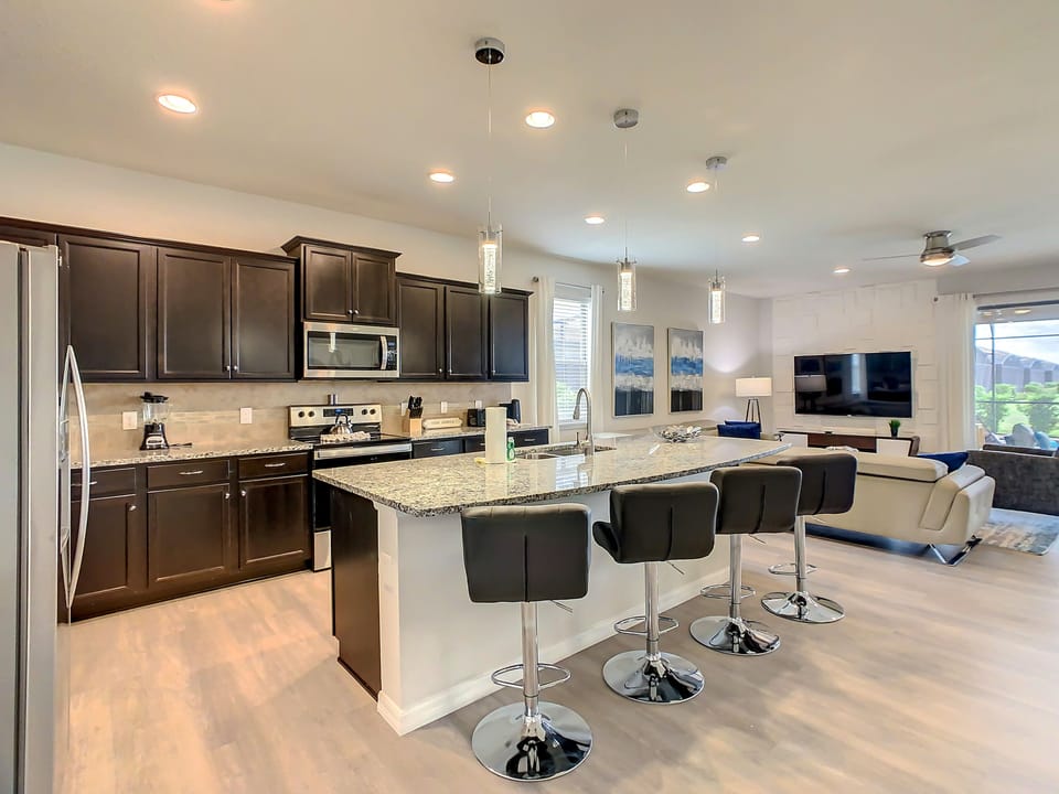 Breakfast Counter And Full Modern Kitchen