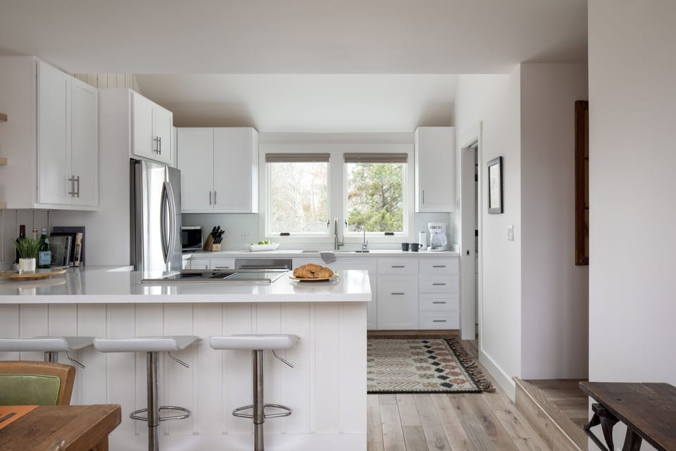Eating in is easy in the well-equipped, remodeled kitchen.  