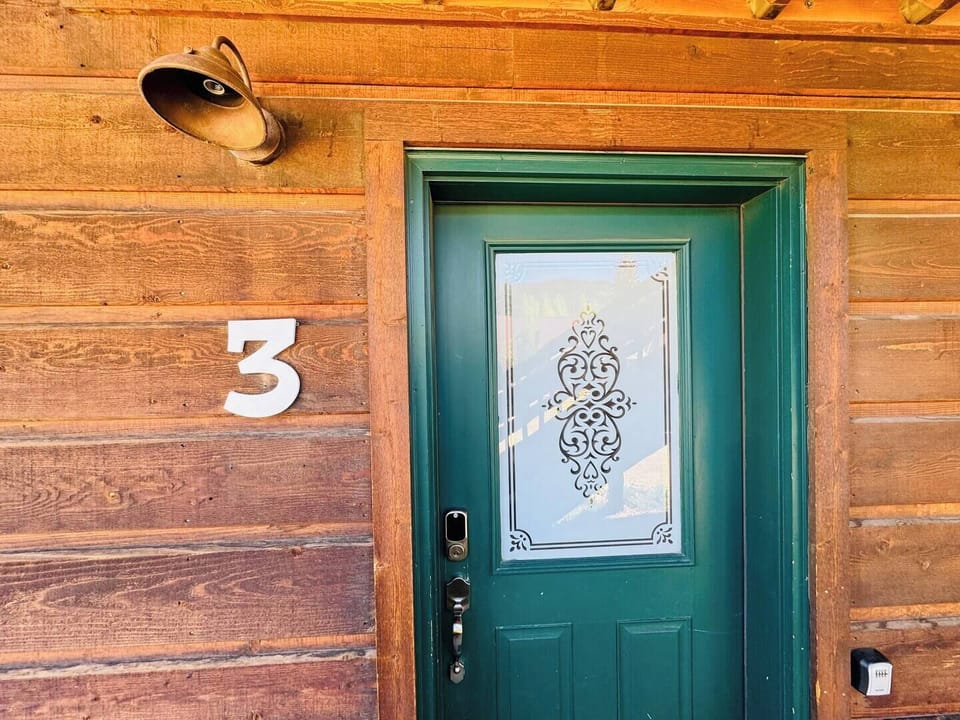 Step into a cozy retreat at The Loose Moose Lodge, with a charming exterior that reflects its natural surroundings. Nestled in Grand Lake, this condo offers the ideal location for mountain adventures.