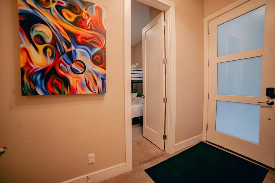 Modern elegance unfolds in Bedroom 3: Your retreat awaits in this tastefully designed room in a 3-bedroom Denver apartment.