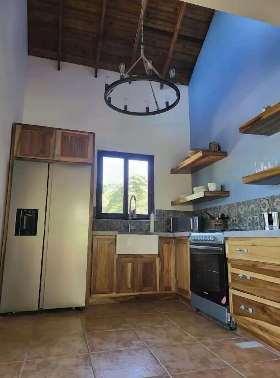 Fully equipped kitchen with expansive vaulted ceilings!