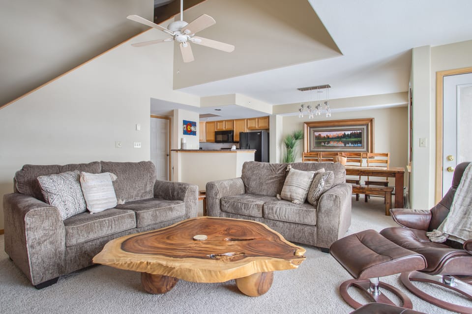 Main level living room, dining area and kitchen