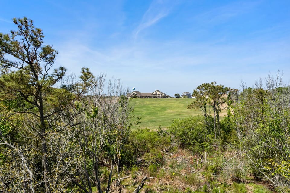 CC138: All Inn and Then Some | Top Level Back Deck Golf Course View
