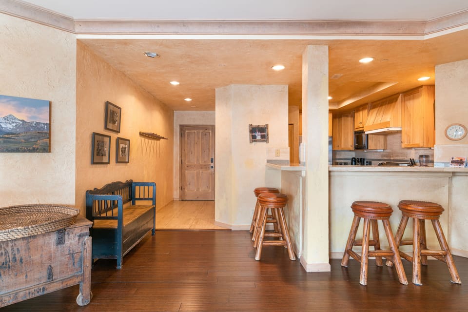 Barstool seating at the kitchen counter.
