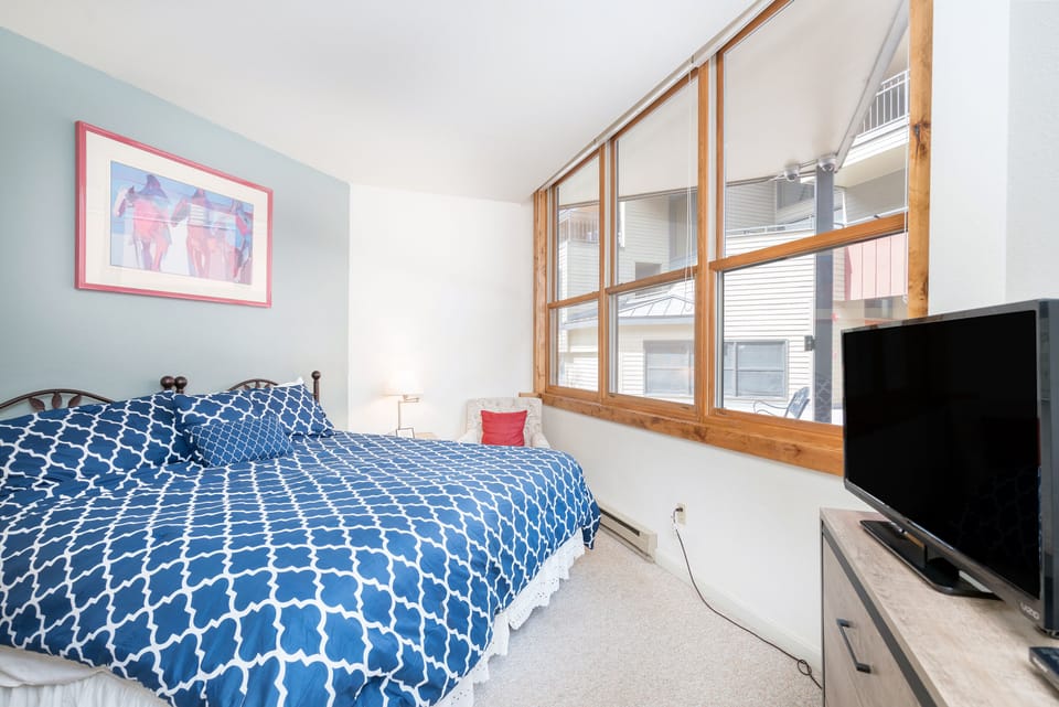Primary bedroom features a king bed.