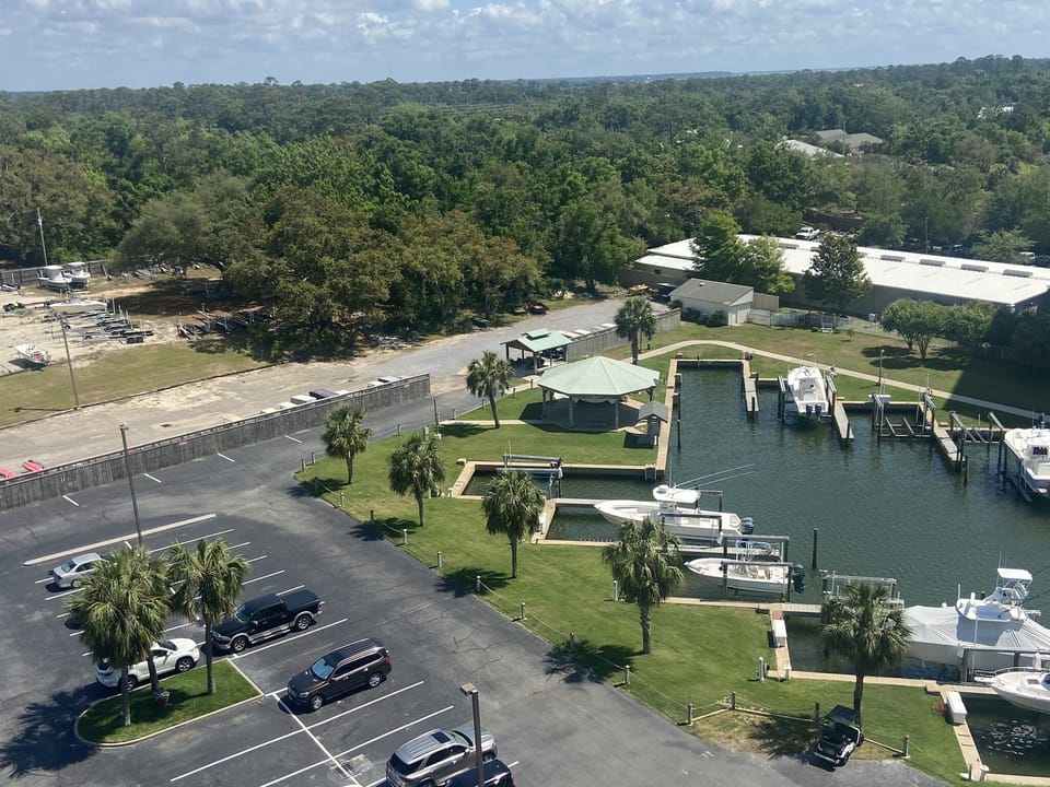 Marina, located beside Back Bay (owners only). Grills in gazebo. Easy parking.