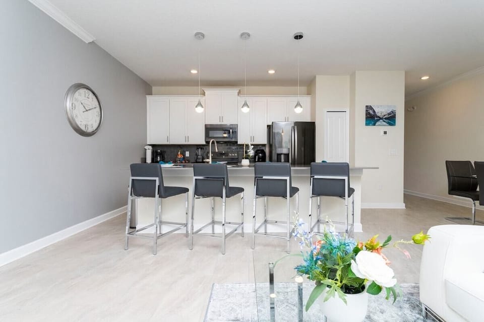 Fall in love with our stunning open kitchen—a beautiful, vibrant space that seamlessly combines style and functionality. a family-friendly retreat where the joy of cooking meets the warmth of togetherness.