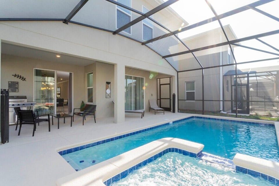 Let's explore this amazing outdoor space! Enjoy a spacious private pool, relax on stylish outdoor furniture. Fire up the grill for a barbecue and create unforgettable family moments. This isn’t just a vacation—it's your private retreat!