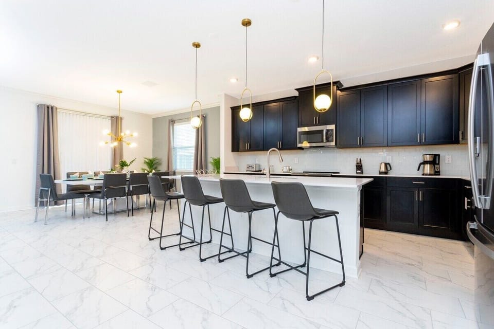 Fall in love for modern luxury with our stunning open kitchen—a beautiful, vibrant space that seamlessly combines style and functionality. a family-friendly retreat where the joy of cooking meets the warmth of togetherness.