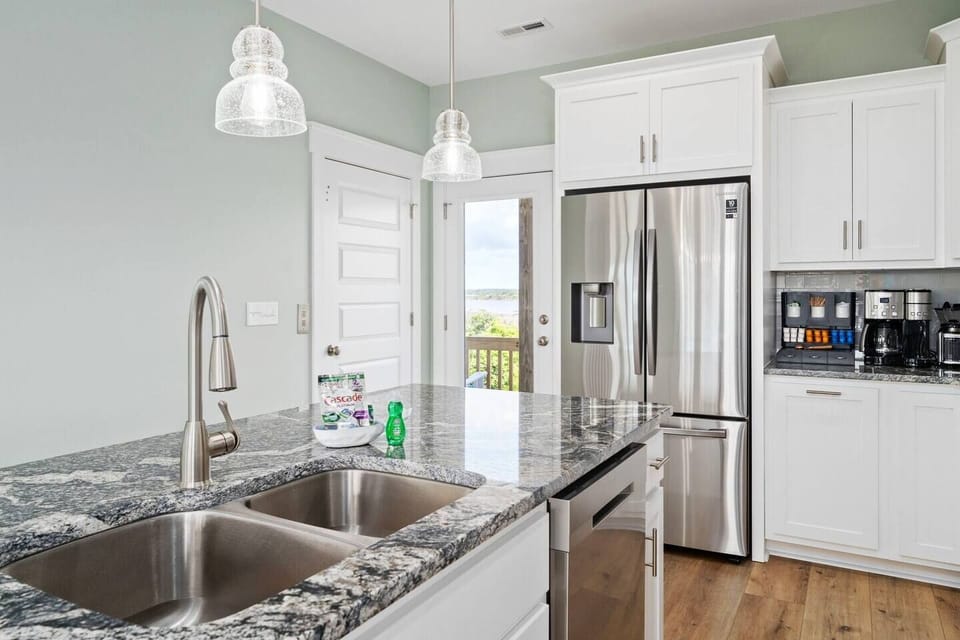 Ample Refrigerator Capacity with Convenient Bottom Freezers, as well as an extra beverage cooler provided separately. Enjoy the Ease of a Smart Dishwasher, with Kitchen Soaps Provided for Your Convenience.
