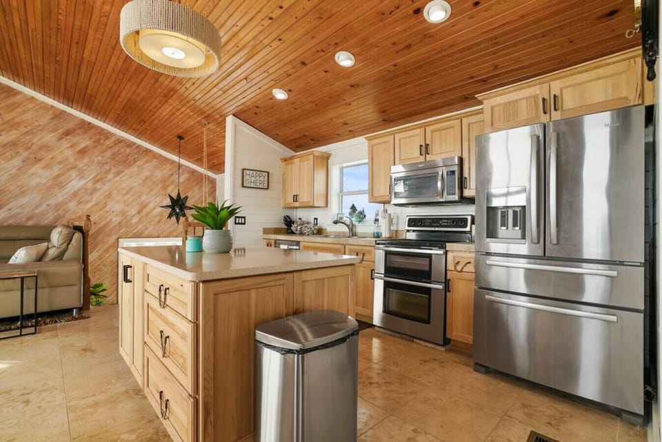 Fully equipped kitchen with stainless steel appliances