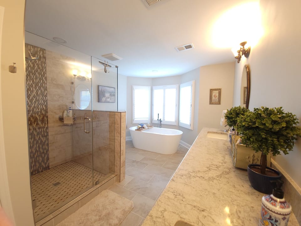 Primary bathroom with oversize shower and soaking tub
