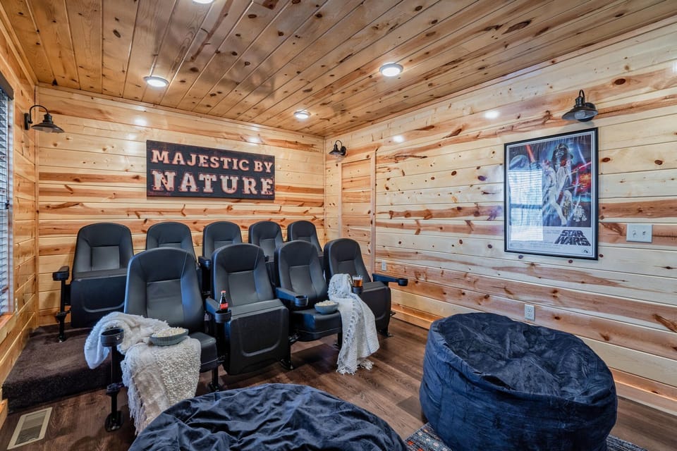 Watch your favorite movie in the theater room with popcorn and drink holders!
