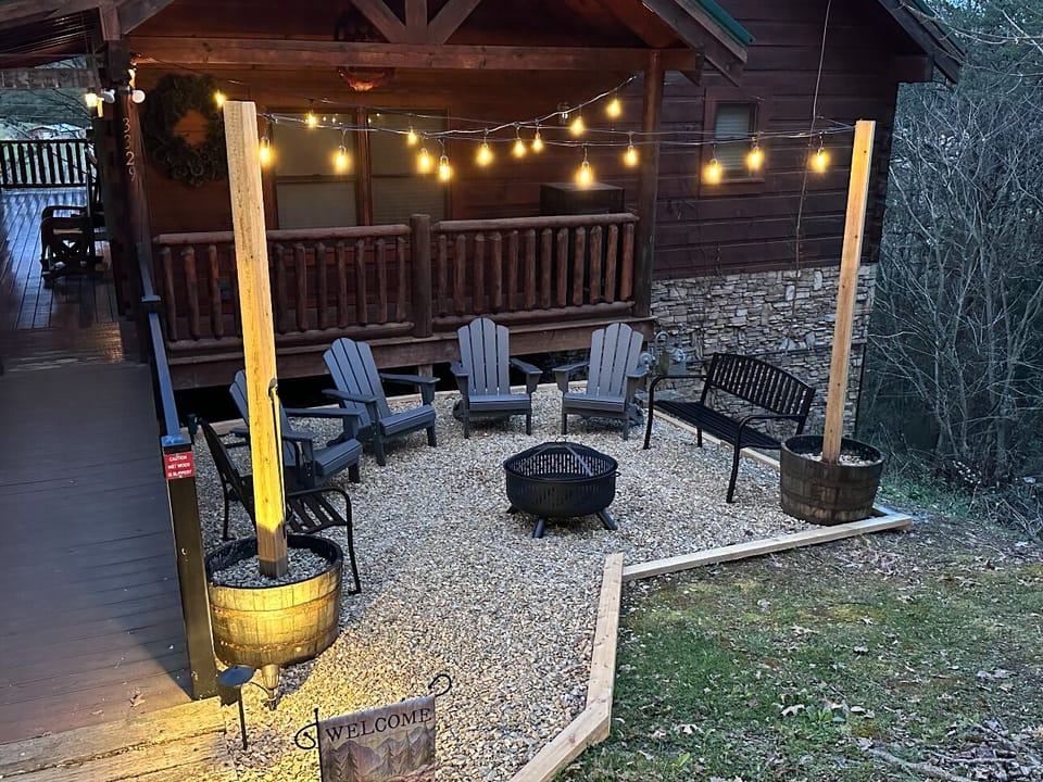 Cozy outdoor firepit with seating and string lights—perfect for relaxing!