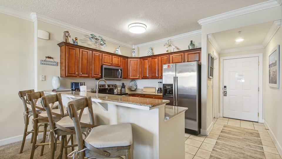 Full Kitchen with bar stools