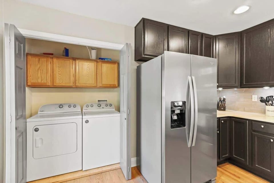 Appliance elegance! From keeping groceries cool to handling laundry with finesse, our home is equipped with top-notch fridge, washer, and dryer for your convenience.