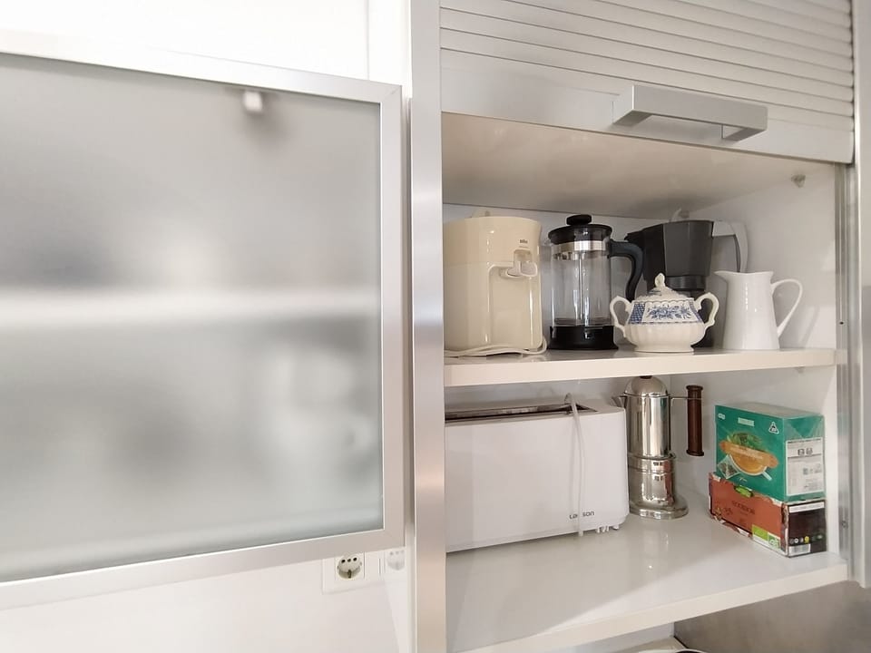 Kitchen with coffee maker, toaster, etc.