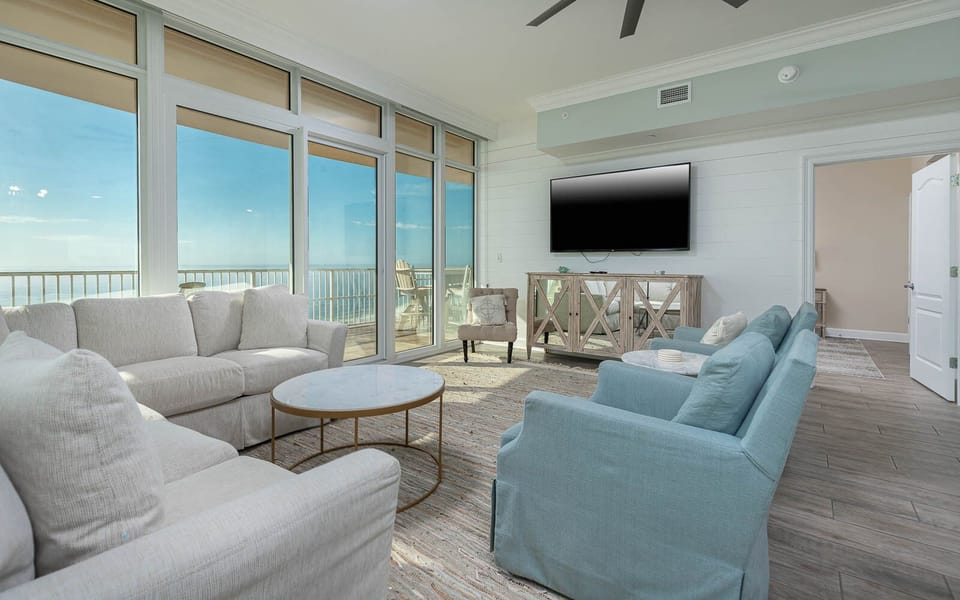Relax in the cozy living area, streaming your favorite shows while enjoying stunning coast views from the large windows