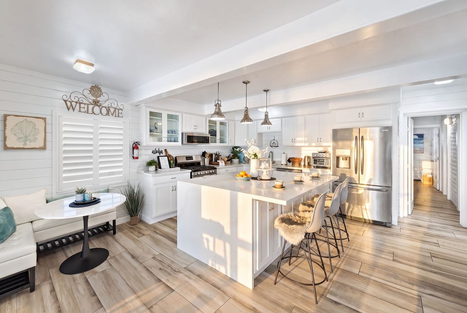 Entry level kitchen with island and nook area. 