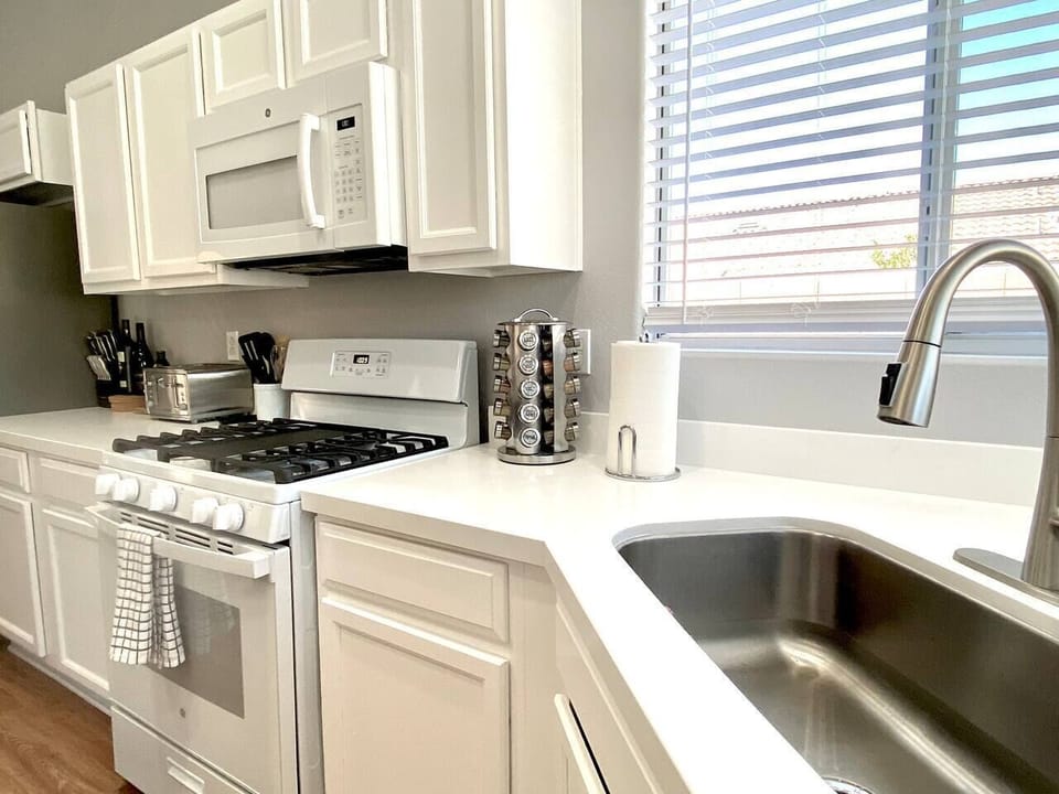 Stocked kitchen with all your basic culinary needs.