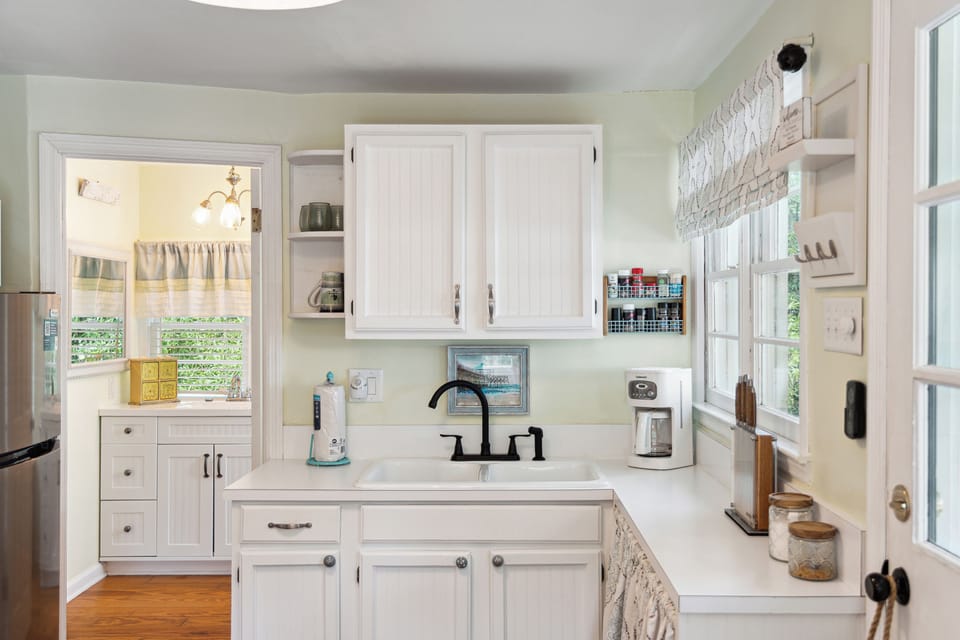 Kitchen is fully equipped for meals at home.