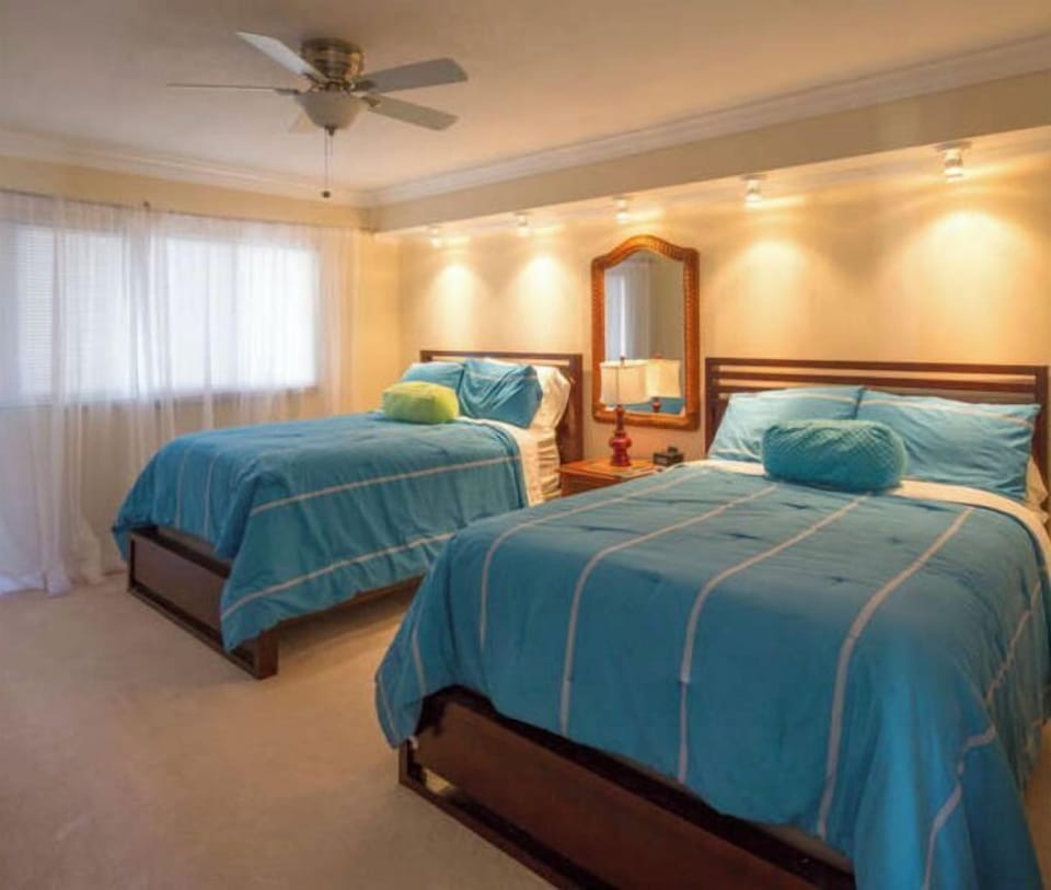 Guest bedroom with two double beds