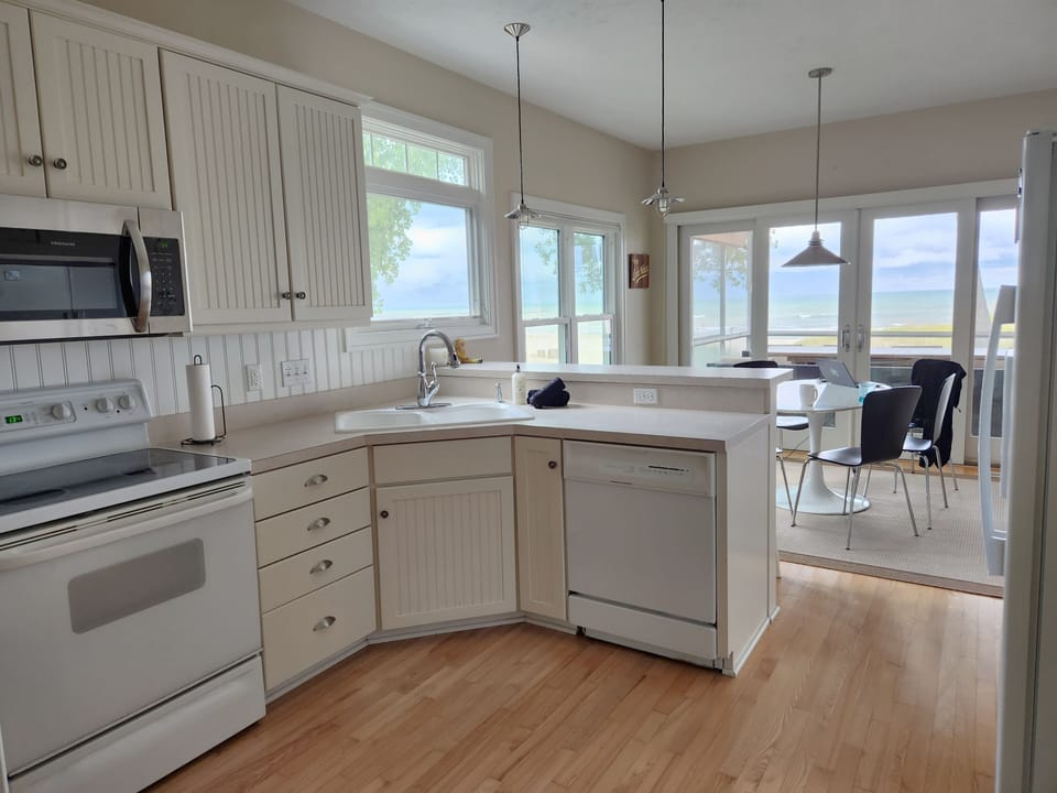 Even the kitchen has a fantastic view of the beach - overlooks dinning and porch