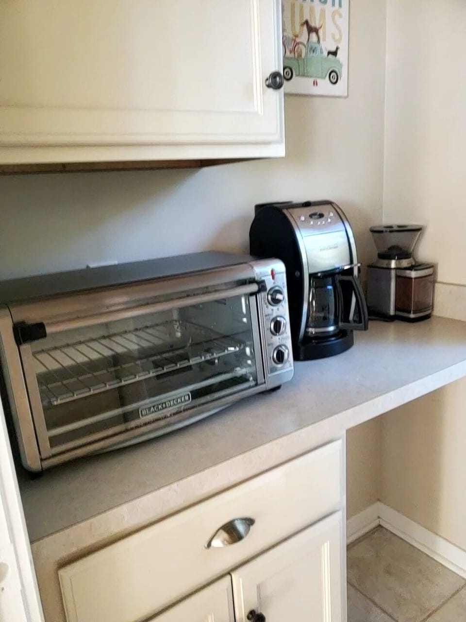 Main level coffee nook with toaster, grinder, and drip machine. Just off kitchen