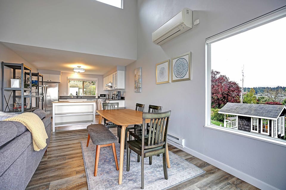 The kitchen opens up to the dining area. Our heat pump keeps a comfortable temp.