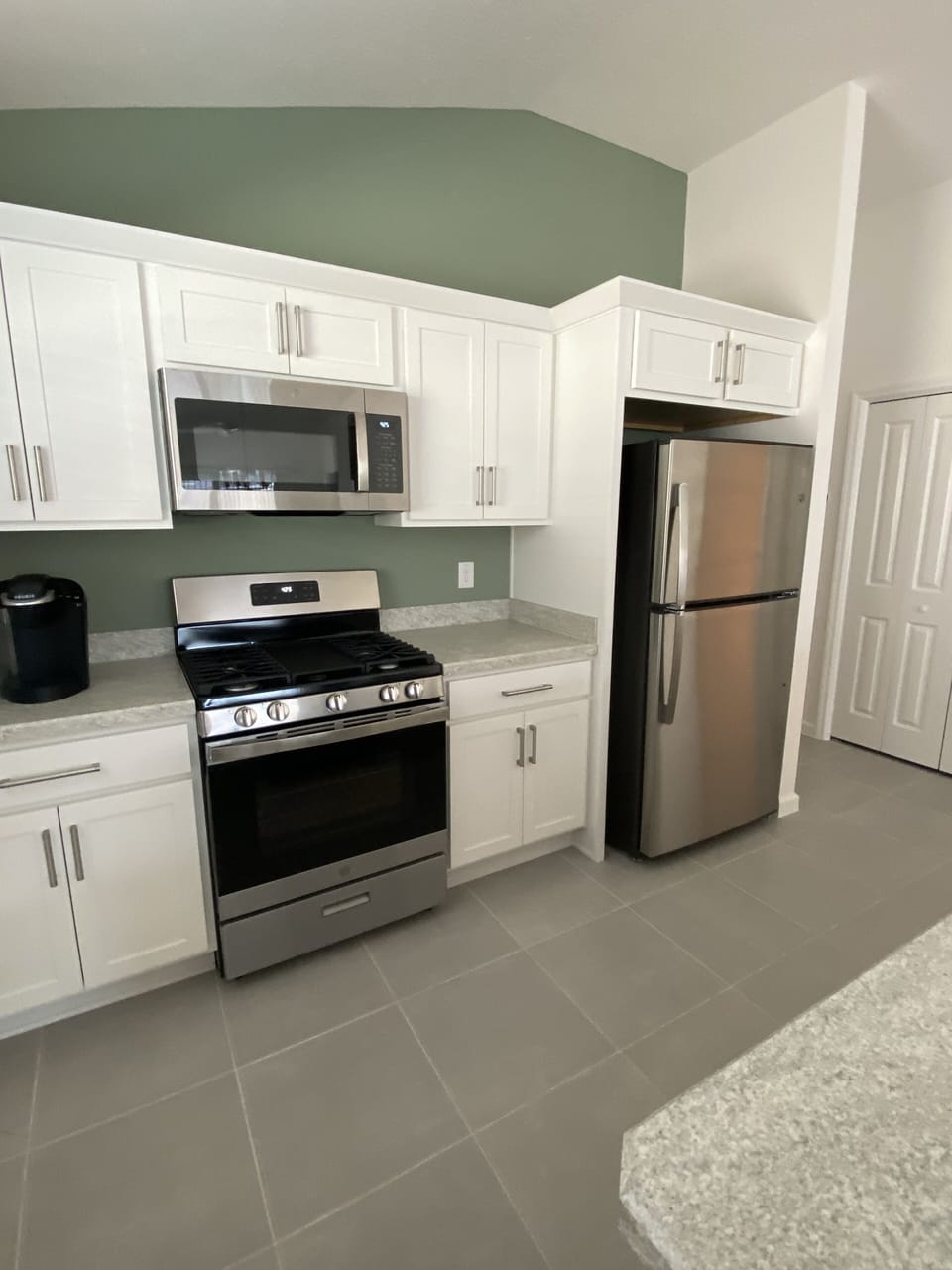 Kitchen includes Keurig Coffee Maker and other Kitchen Essentials