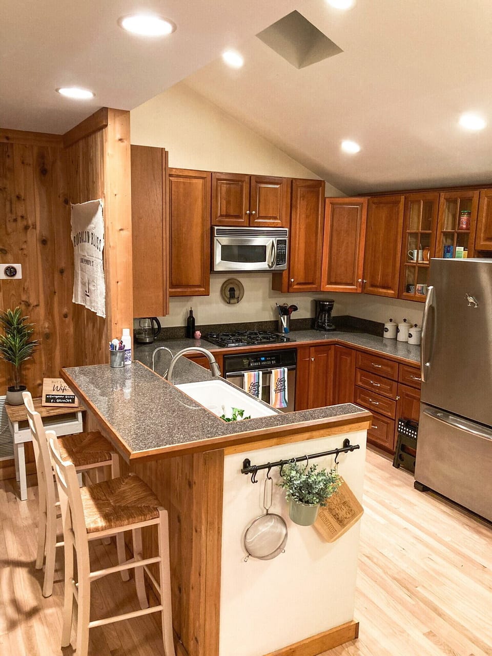 Kitchen with vaulted ceilings and tons of natural light from the skylight