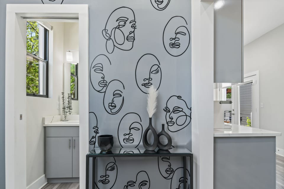 hallway between kitchen and half bath