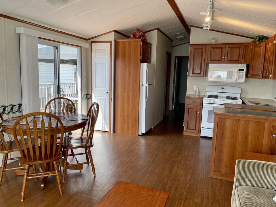 View from the couch to the sliding door to the deck