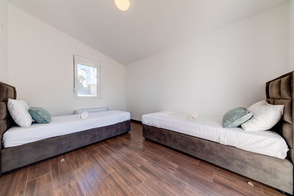 Second bedroom with comfy single beds