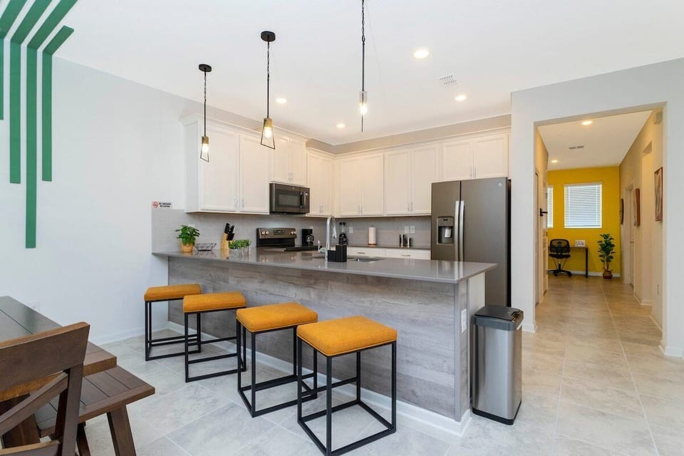 Fall in love for modern luxury with our stunning open kitchen—a beautiful, vibrant space that seamlessly combines style and functionality. a family-friendly retreat where the joy of cooking meets the warmth of togetherness.