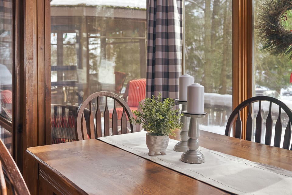 Kitchen sitting area with a nice large window for viewing outside. 