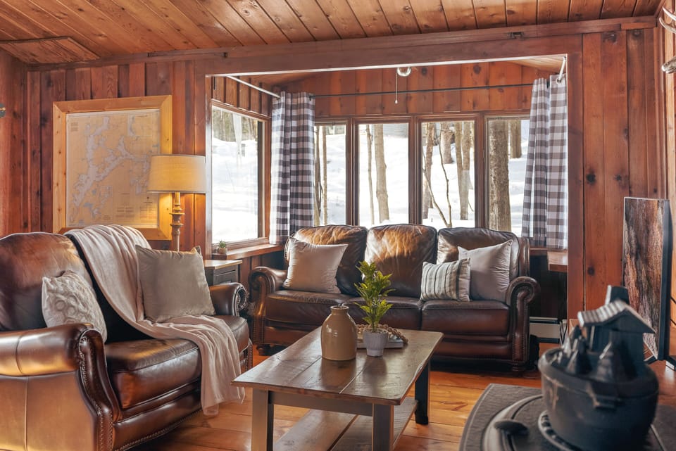 Living room with couch,  love seat and recliner. 