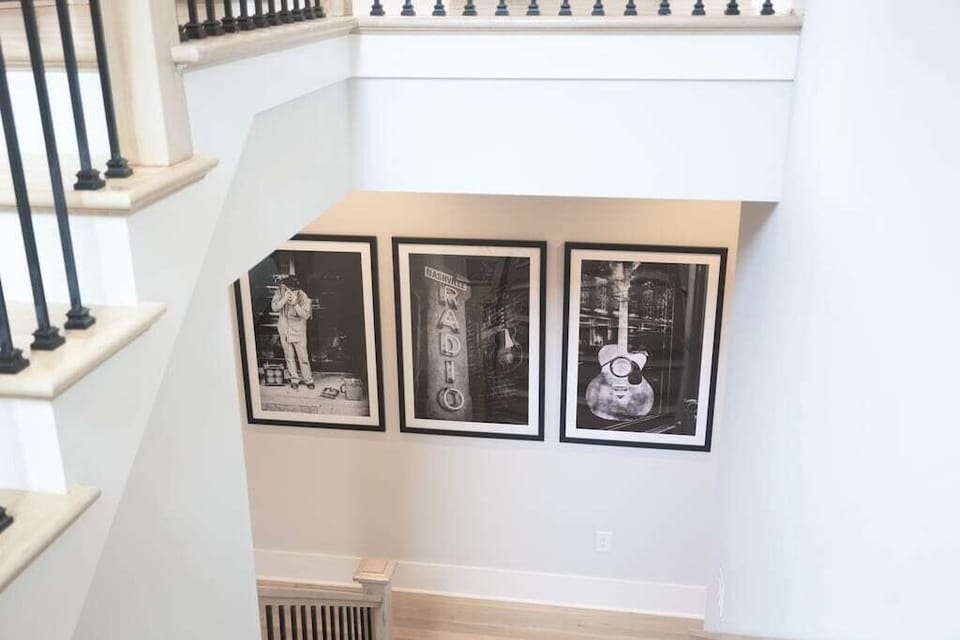 The second level features hardwood floors throughout along with the primary bedroom and ensuite. There is also two more private bedrooms and an additional full bathroom. Each bedroom has a comfortable king size mattress and a unique artistic mural.