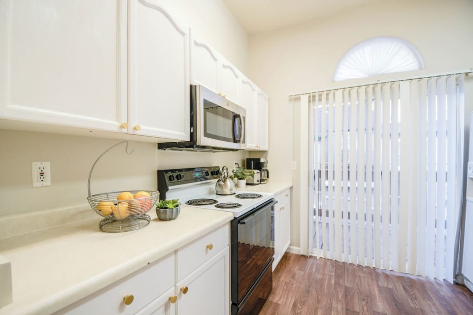 The kitchen area with full kitchen items. 